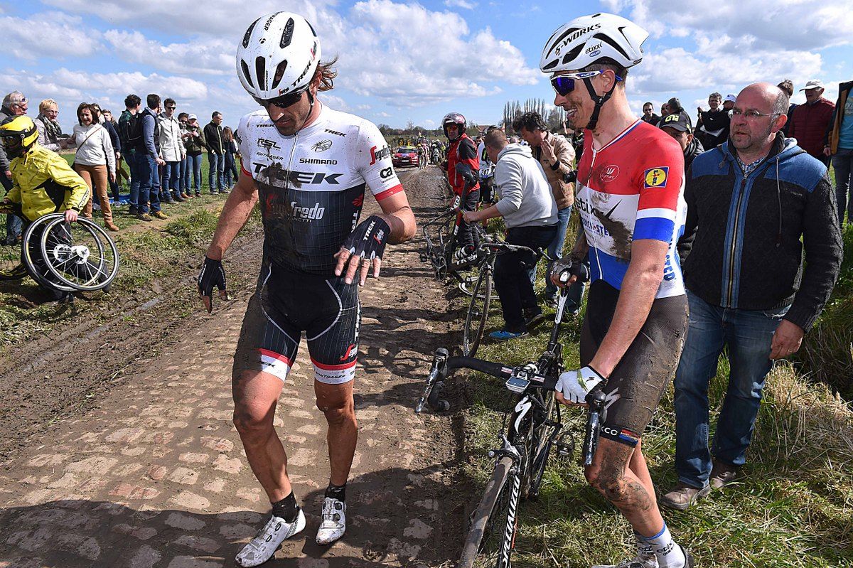 Fabian Cancellara gets to his feet as Niki Terpstra sees the funny side