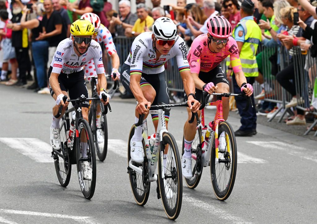 PAU FRANCE JULY 12 LR Adam Yates of The United Kingdom and UAE Team Emirates Mathieu van der Poel of Netherlands and Team Alpecin Deceuninck and Neilson Powless of of The United States and Team EF Education EasyPost compete in the breakaway during the 111th Tour de France 2024 Stage 13 a 1653km stage from Agen to Pau UCIWT on July 12 2024 in Pau France Photo by Tim de WaeleGetty Images