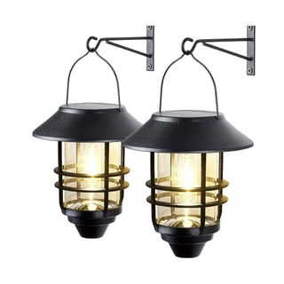 2 Pack Solar Lantern Wall Lights Fixtures with the lights lit up