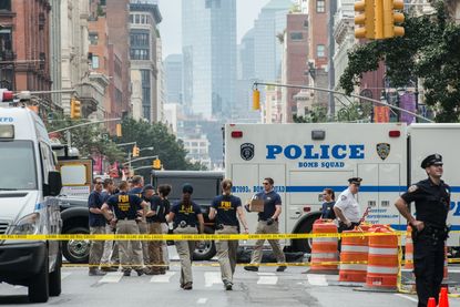 FBI agents and law enforcement examine bomb debris in New York 