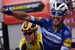 Julian Alaphilippe thumps the air after winning Milan-San Remo 2019