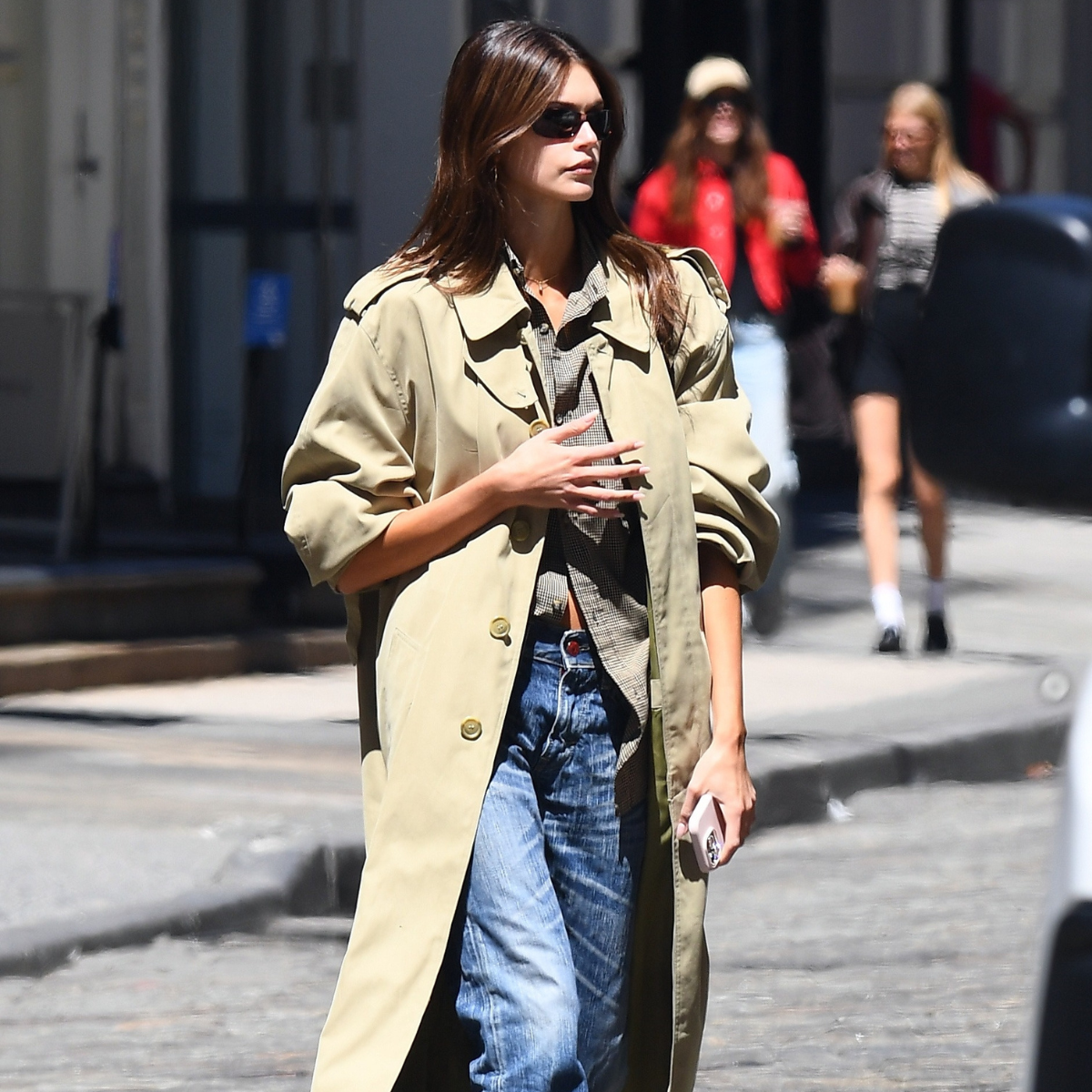 hannah strafford taylor wearing a trench coat