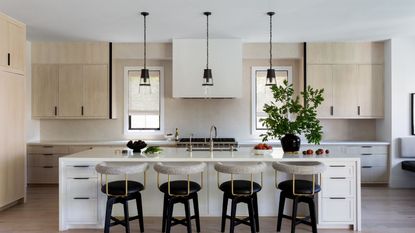 kitchen with pale wood and white units