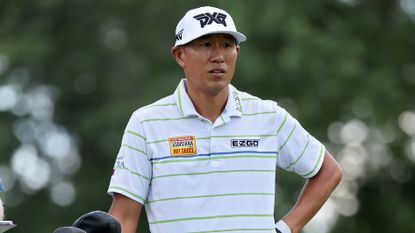 James Hahn pictured standing by his golf bag