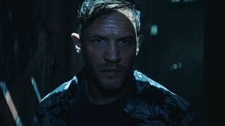 Tom Hardy in Venom 3 looking angrily ahead of him.