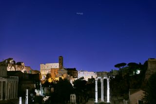 Neptune shining above the iconic Roman Colosseum on Aug. 28, 2018. Though the planet is faint, its blue color is still discernible.
