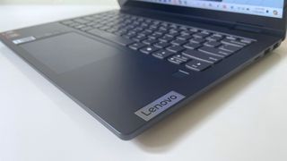 Close up of the Lenovo logo on the keyboard deck of the Lenovo IdeaPad 5 2-in-1