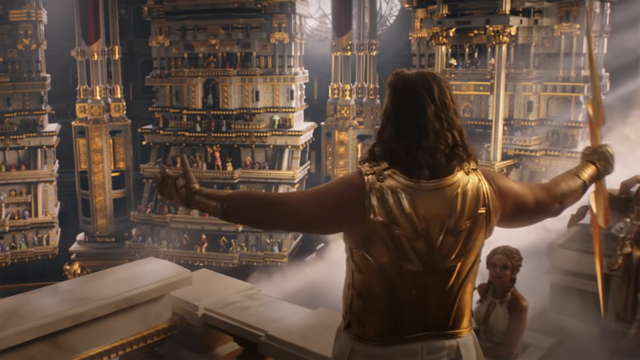 Russell Crowe's Zeus performs in front of the crowd at Olympus in Thor: Love and Thunder