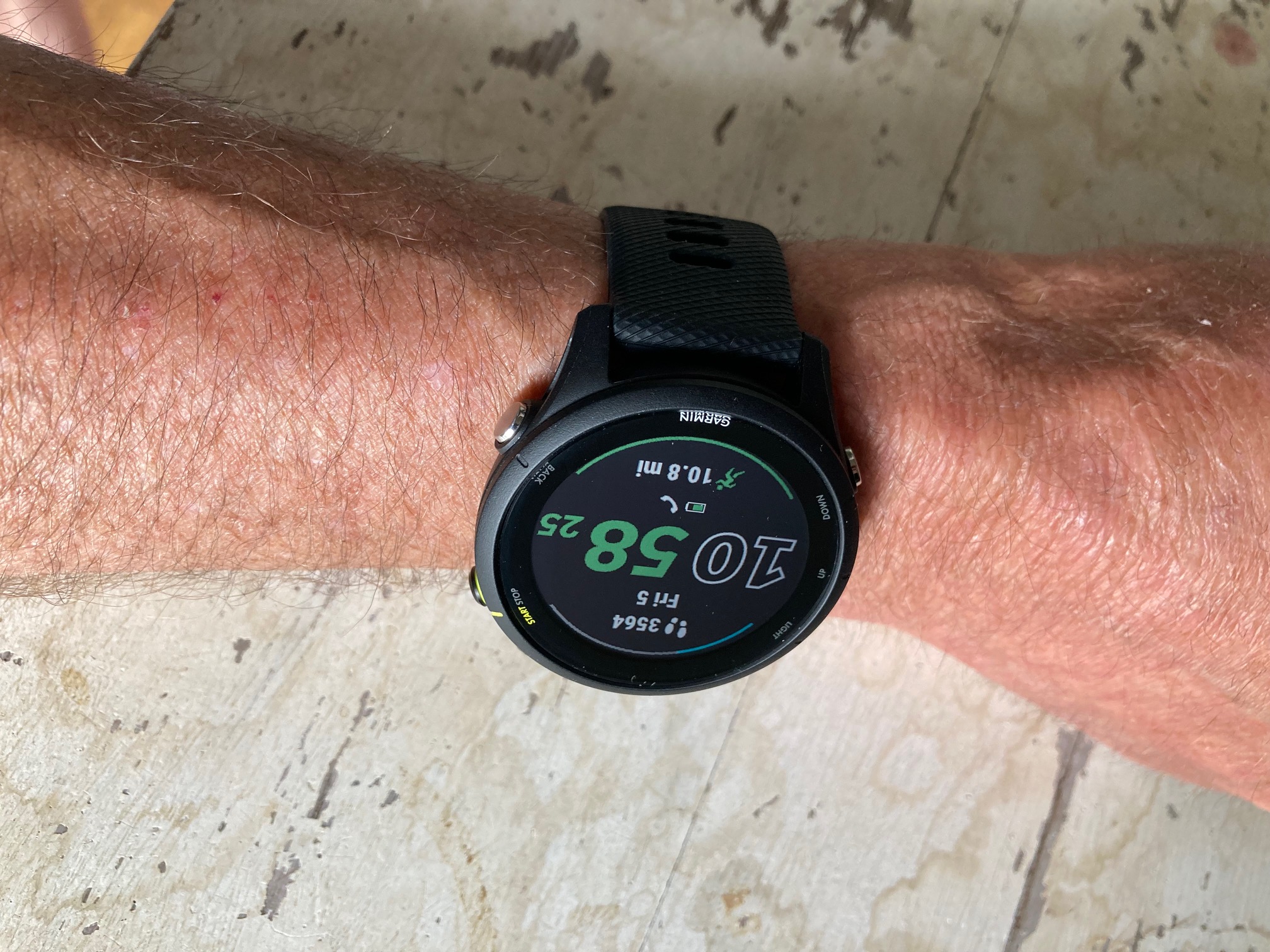 Garmin Forerunner 255 smartwatch on a wrist