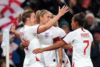 Ellen White (left) celebrates scoring against Germany