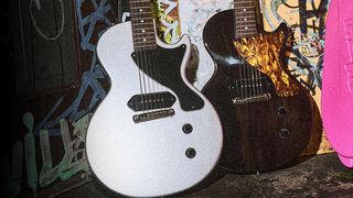 The Gibson Billie Joe Armstrong Les Paul Junior is offered in Vintage Ebony and Silver Mist and features hum-cancelling P-90 pickups
