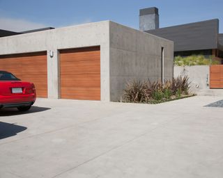 Exterior of modern two-car garage and concrete driveway