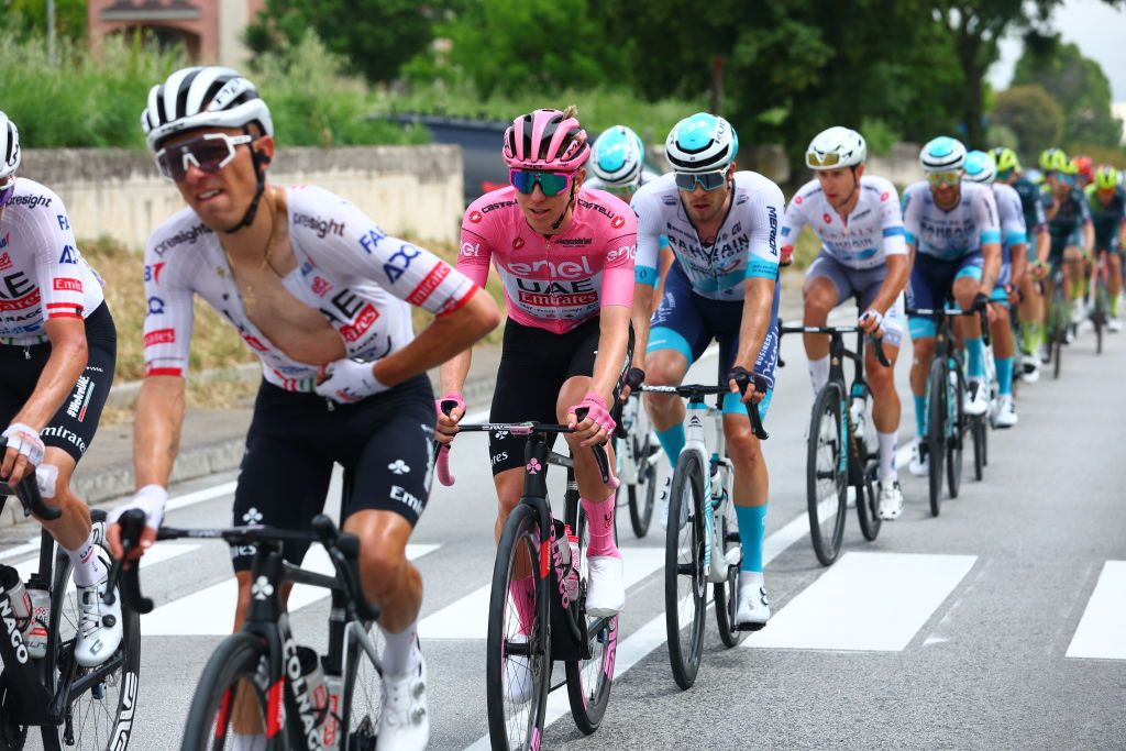 Pink jersey Team UAE's Slovenian rider Tadej Pogacar rides in the pack during the 12th stage of the 107th Giro d'Italia cycling race, 193km between Martinsicuro and Fano, on May 16, 2024. (Photo by Luca Bettini / AFP)