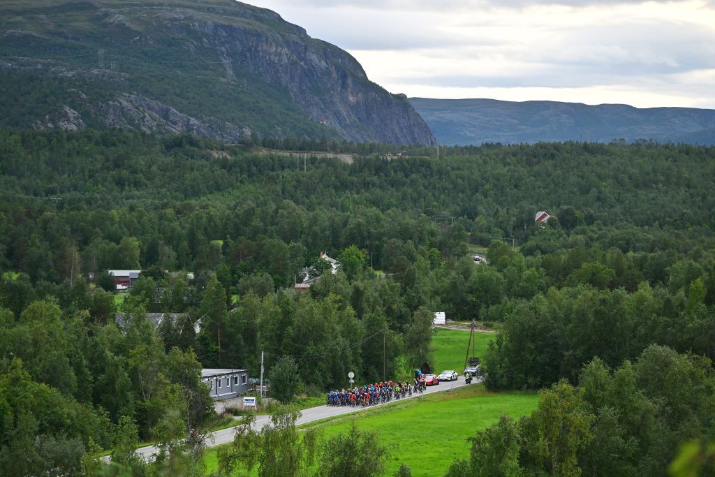HAMMERFEST NORWAY AUGUST 18 A general view of the peloton competing during the 10th Arctic Race of Norway Stage 2 a 1534km stage from Alta to Hammerfest on August 18 2023 in Hammerfest Norway Photo by Luc ClaessenGetty Images