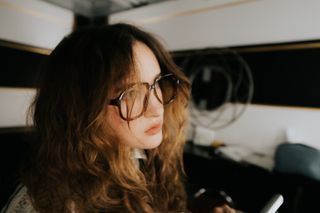 gracie lawrence wears big frame glasses in a candid shot