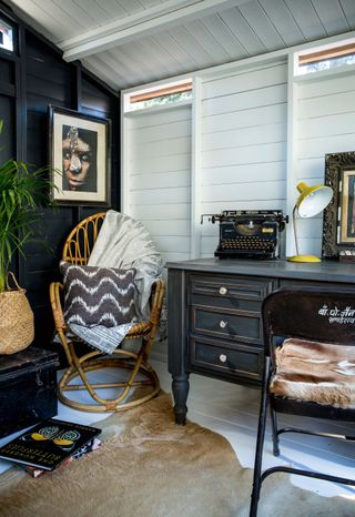 Rustic reading corner with rattan chair