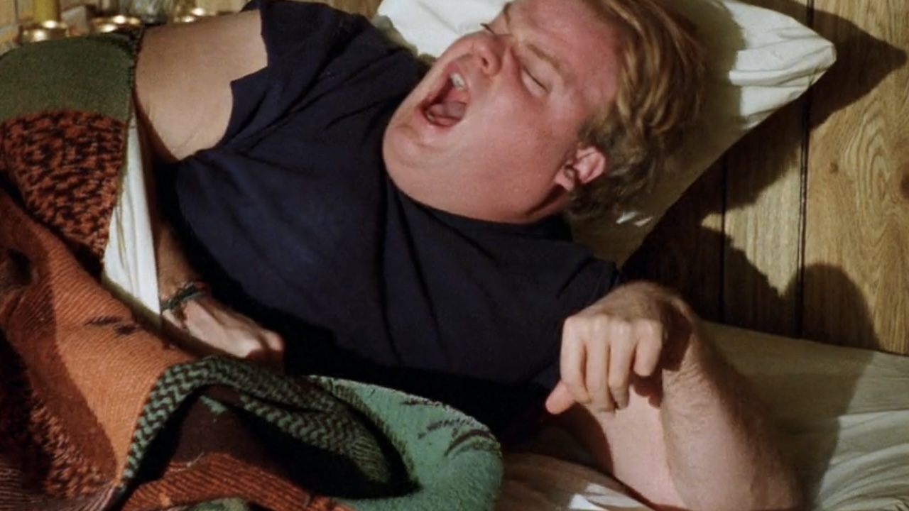 Tommy yelling in bed in Tommy Boy.