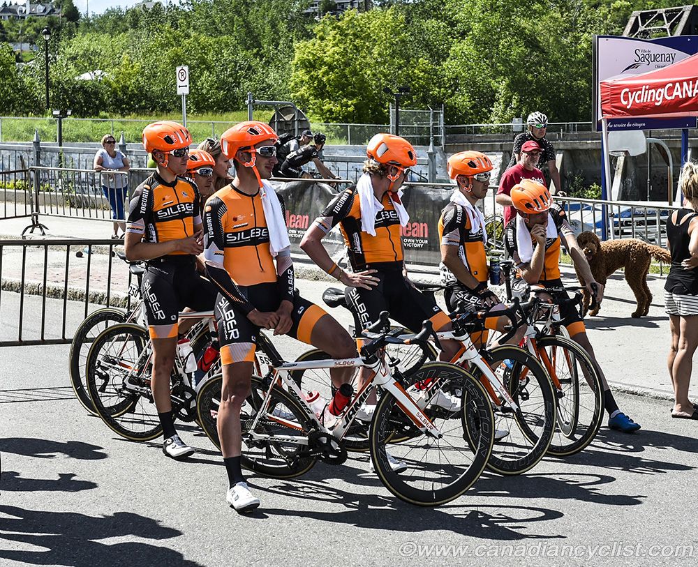 The rest of the Silber Pro Cycling watch the podium