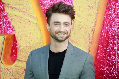 Daniel Radcliffe baby milestone as illustrated by a picture of Daniel Radcliffe attending a premier 