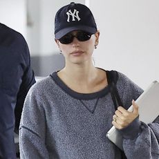 Hailey Bieber was spotted in L.A. wearing black ballet sneakers from Miu Miu