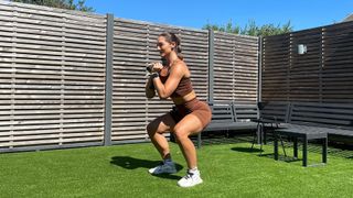 Chelsea Labadini performing a squat