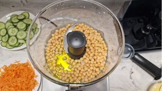 Magimix 4200XL Food Processor with chickpeas inside waiting to be blended