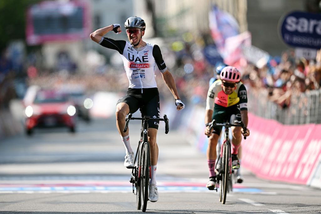 Brandon Mcnulty (UAE Team Emirates) outsprints (Ben Healy EF EducationEasyPost) and Marco Frigo (Israel Premier Tech) to win stage 15