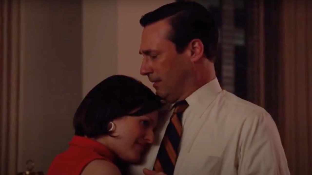 Elisabeth Moss and Jon Hamm dancing on Mad Men