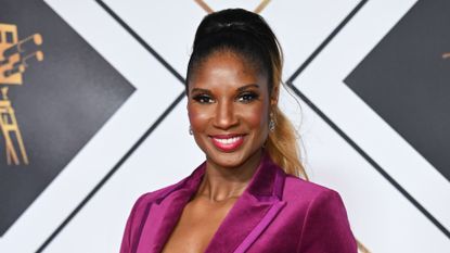Denise Lewis with high ponytail