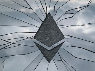 Ethereum cryptocurrency logo engraved on broken glass to show a security failure