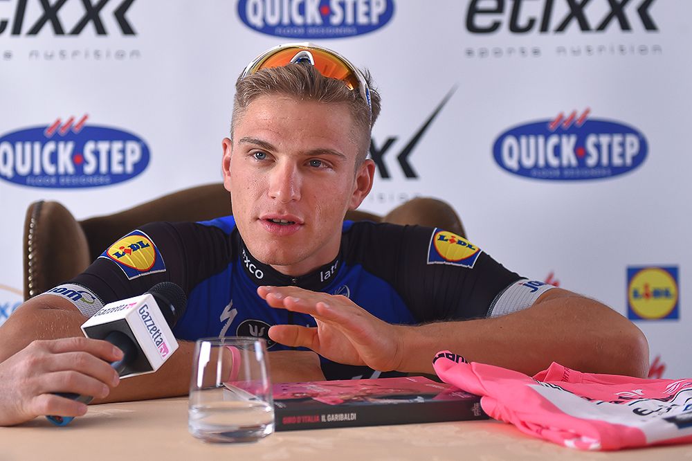 Overall race leader Marcel Kittel talks with reporters during the first rest day of the 2016 Giro d'Italia