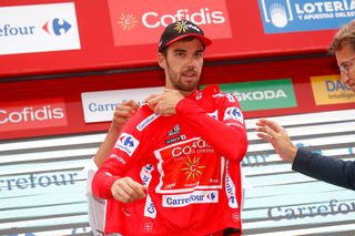 Jesus Herrada (Cofidis) puts on the Vuelta's red jersey after stage 12