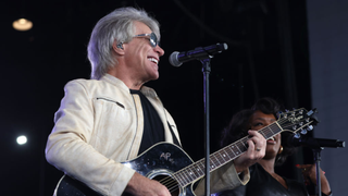 Jon Bon Jovi performs during a campaign rally with Democratic presidential nominee, U.S. Vice President Kamala Harris, at the PNC Music Pavilion on November 02, 2024 in Charlotte, North Carolina.