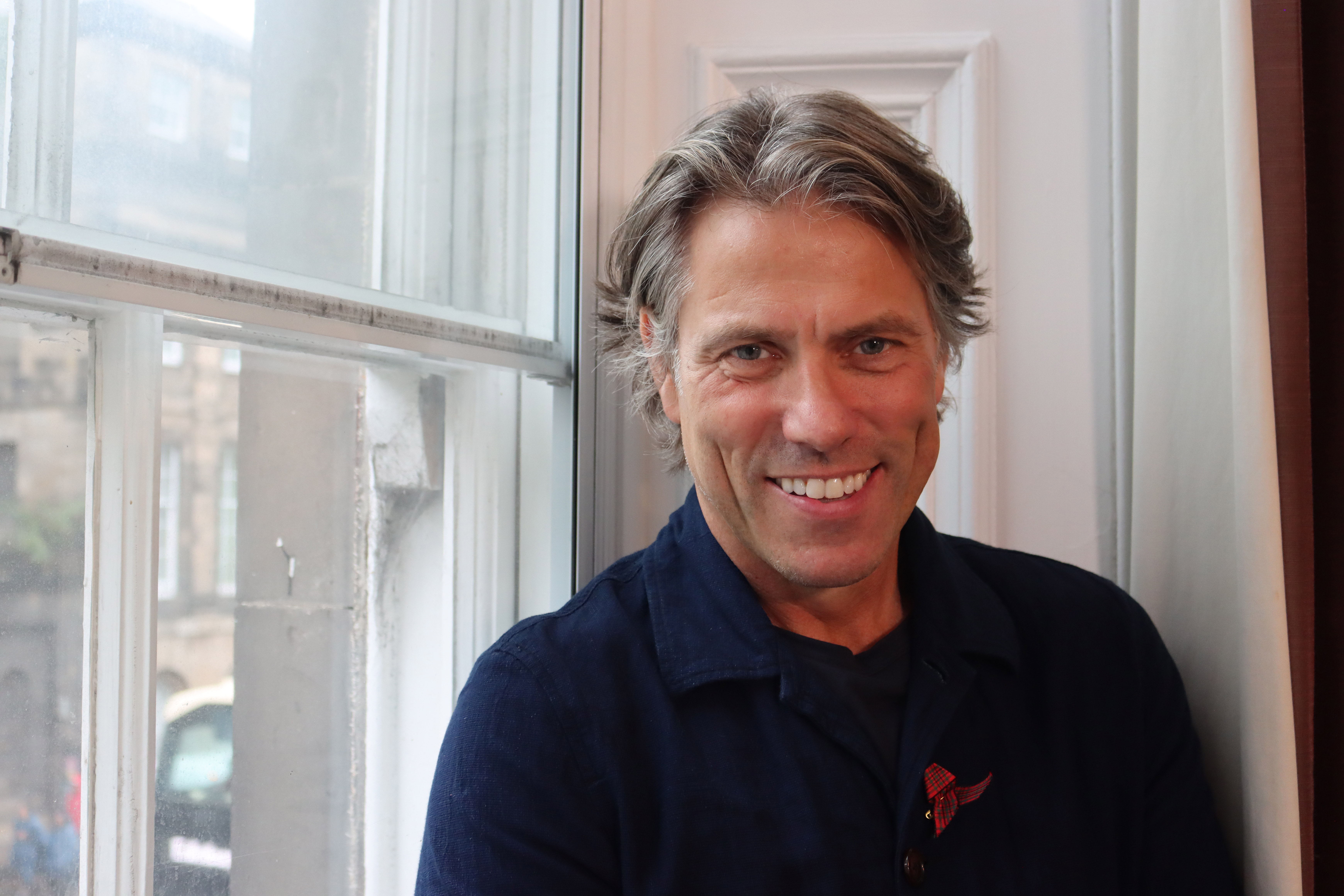 John Bishop learns sign language.
