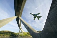 ylesku Bridge in Assynt Scotland UK, with an RAF jet flying past