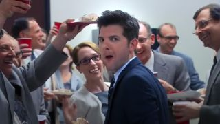 Adam Scott as Ben, at the accounting firm