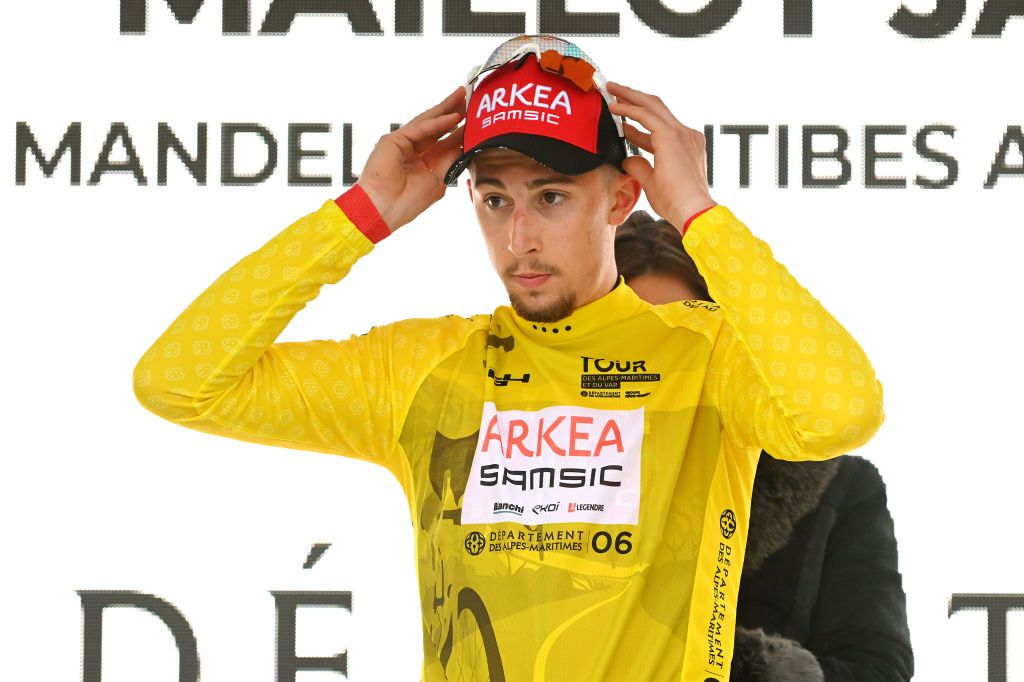 ANTIBES FRANCE FEBRUARY 18 Kvin Vauquelin of France and Team Arka Samsic celebrates at podium as Yellow Leader Jersey winner during the 55th Tour Des Alpes Maritimes Et Du Var 2023 Stage 2 a 1794km stage from MandelieulaNapoule to Antibes tour0683 on February 18 2023 in Antibes France Photo by Luc ClaessenGetty Images