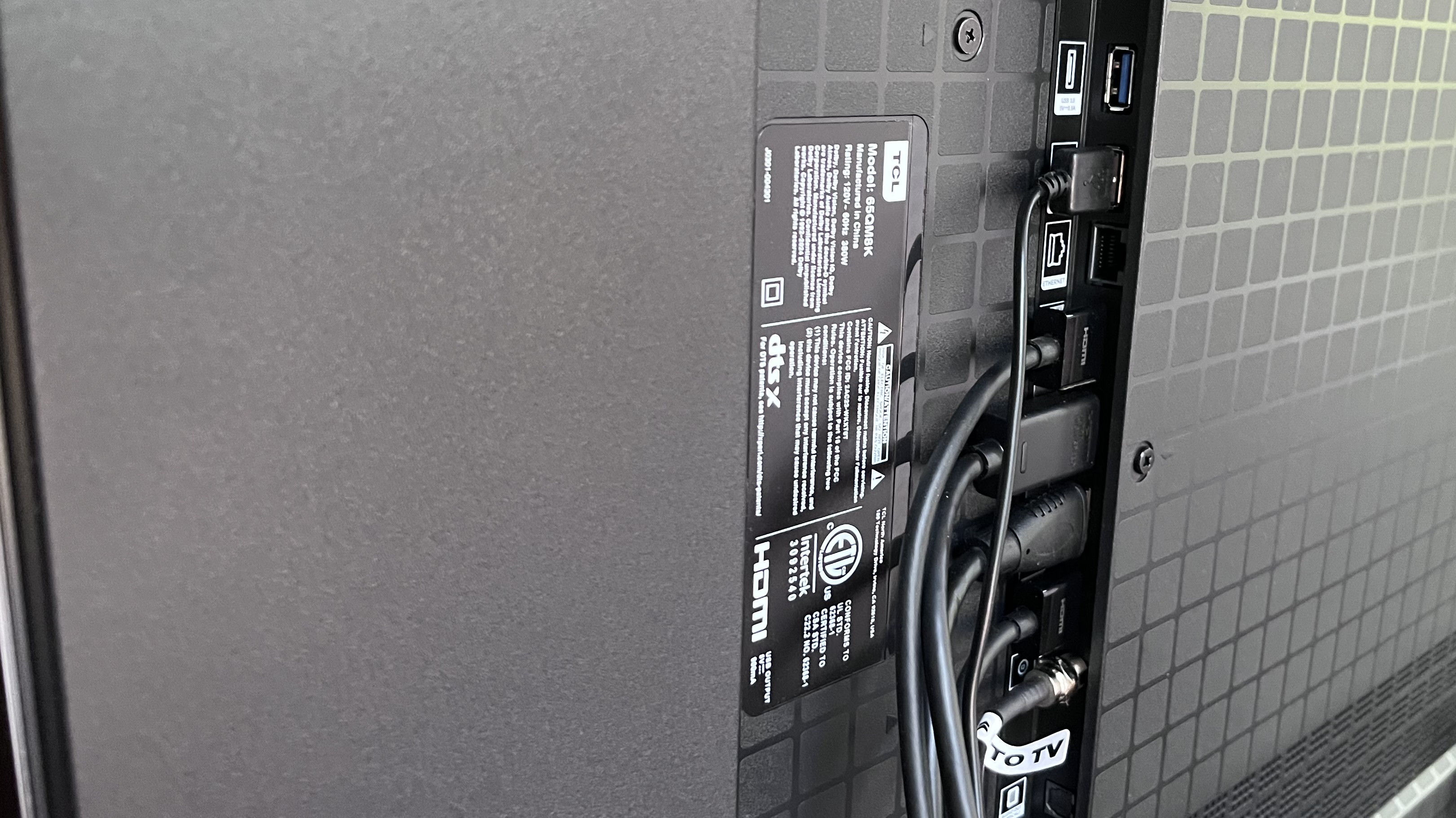 TCL QM8K side panel ports