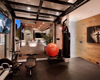A contemporary home gym in a converted garage in Orange County, CA