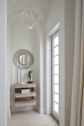 Small hallway with shelving storage