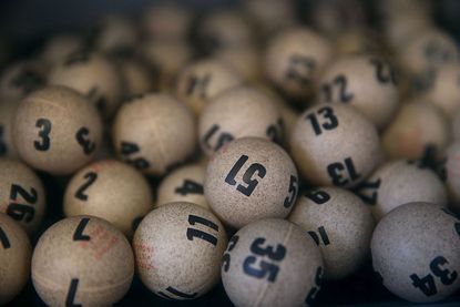 At least 3 three people split the record Powerball jackpot