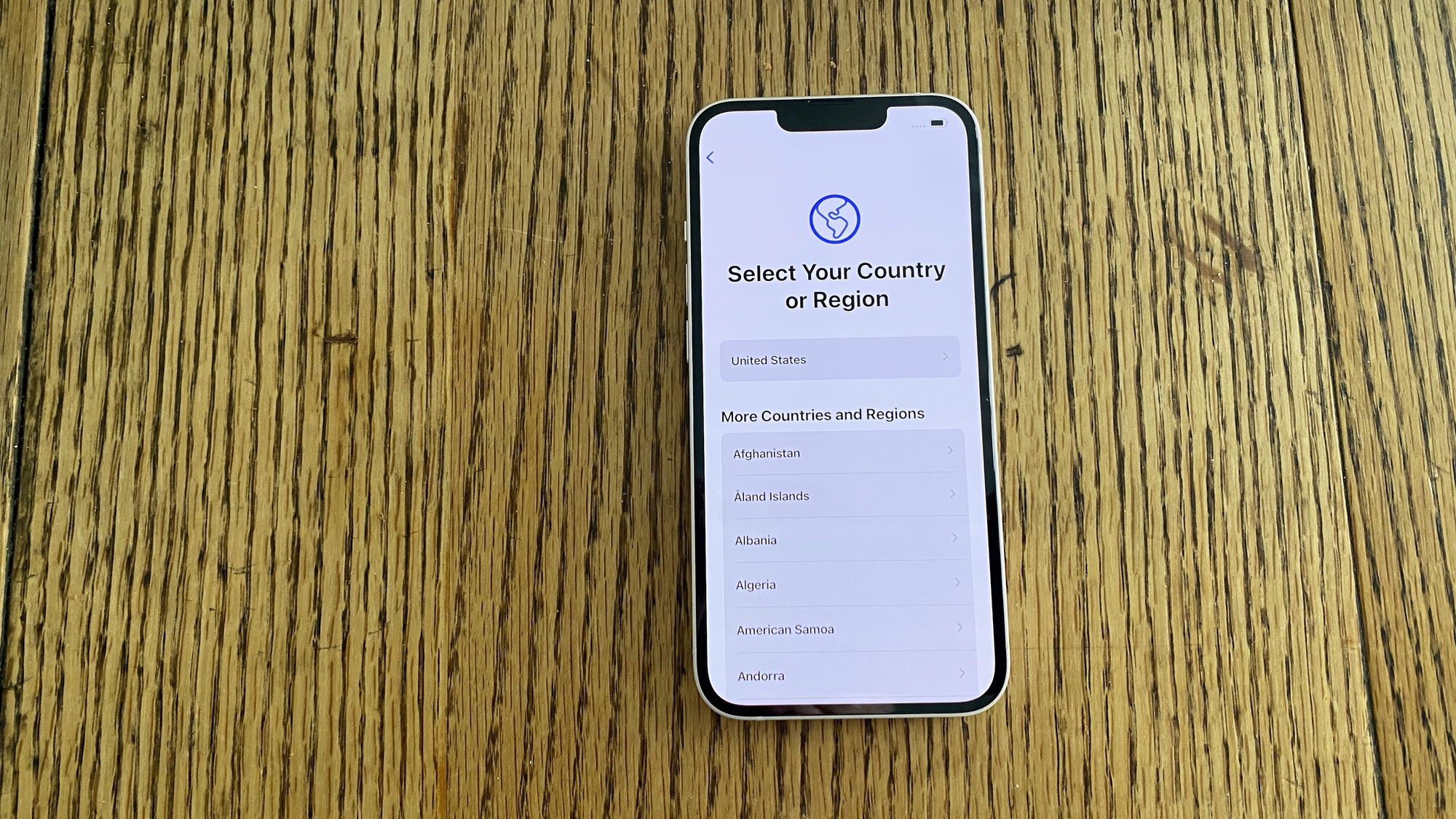 Выберите свою страну на своем iPhone 13 при использовании быстрого старта