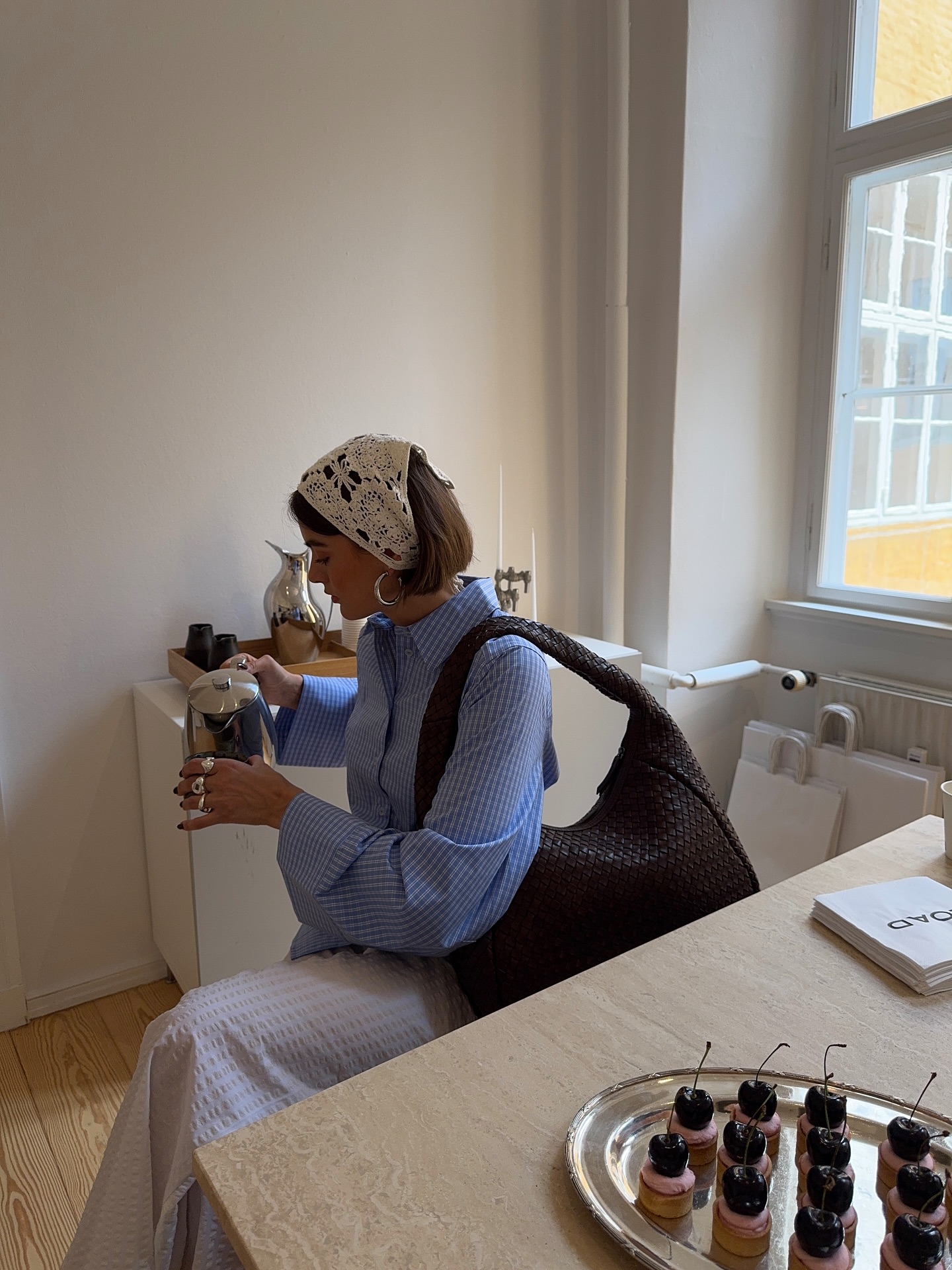 Mary L. Jean wearing a white bandana with a bob