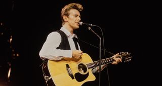David Bowie performs with a 12-string cutaway acoustic during the Sound and Vision Tour.