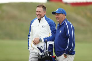Ian Poulter with long time caddie Terry Mundy