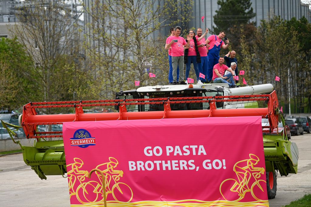 VISEGRAD HUNGARY MAY 06 Fans dressed in pink wait for the peloton to pass during the 105th Giro dItalia 2022 Stage 1 a 195km stage from Budapest to Visegrd 337m Giro WorldTour on May 06 2022 in Visegrad Hungary Photo by Tim de WaeleGetty Images