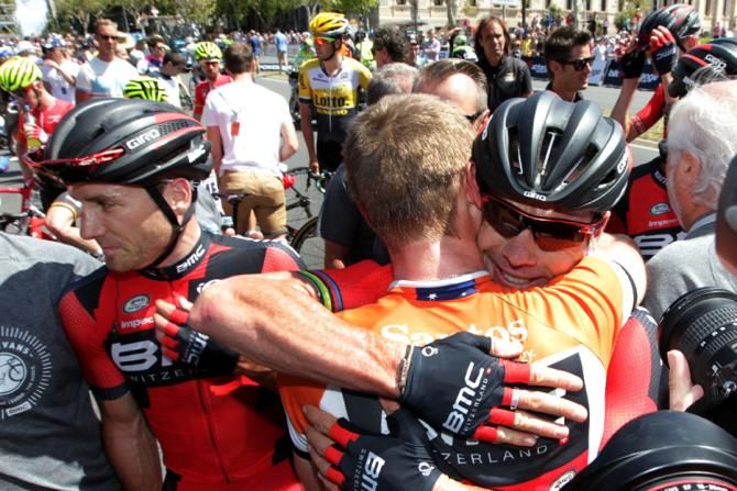 Cadel Evans hugs teammate Rohan Dennis after sealing overall victory