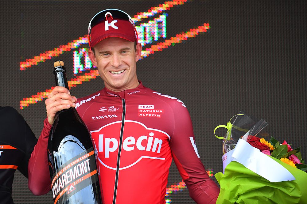 Alexander Kristoff on the podium after winning stage 2 at Three Days of De Panne