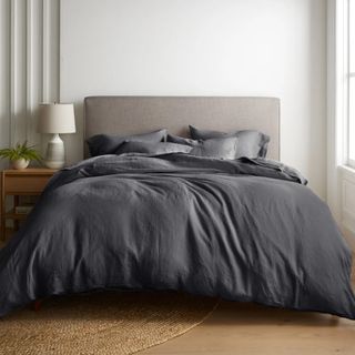 Black bedding sets on bed in bedroom lifestyle image