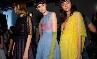 T-shirts styled with these dramatic frocks and layered peplums underlined that nonchalant feeling